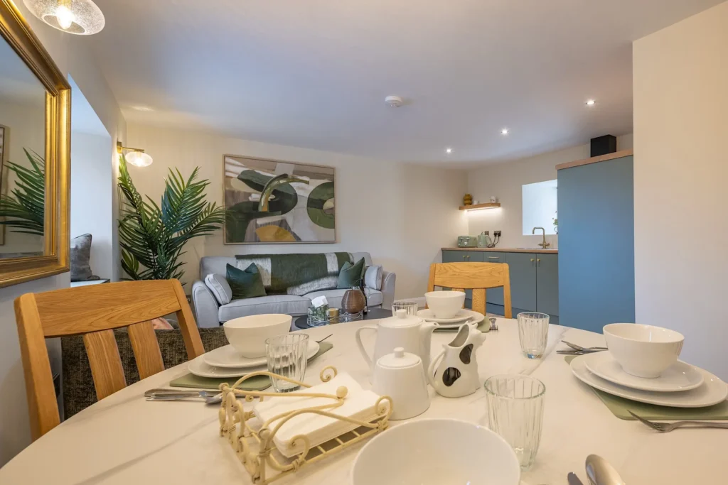 Open-plan dining, living and kitchen area at Tower Lodge