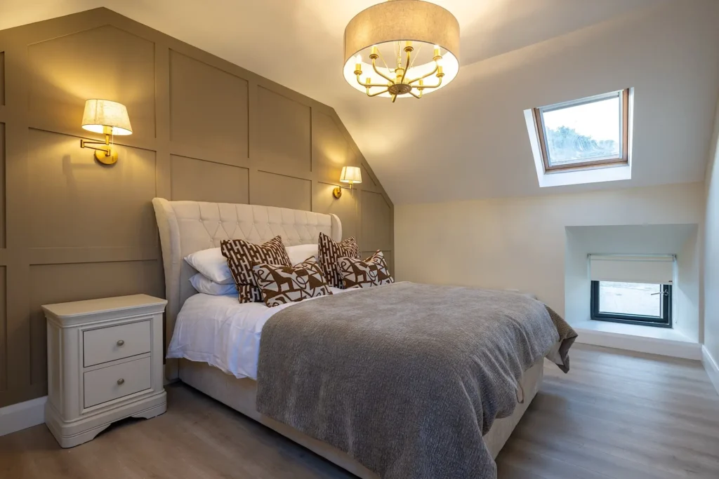 King bedroom with skylight at Tower Lodge